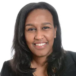 A woman smiling for the camera