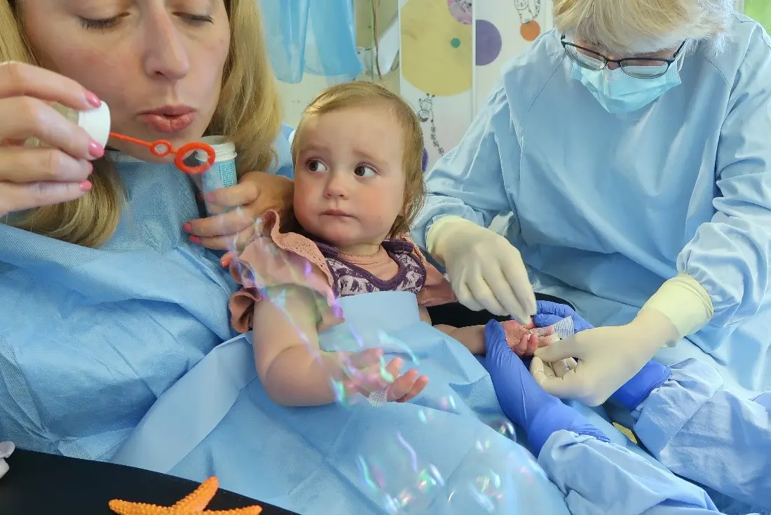 A person and a baby