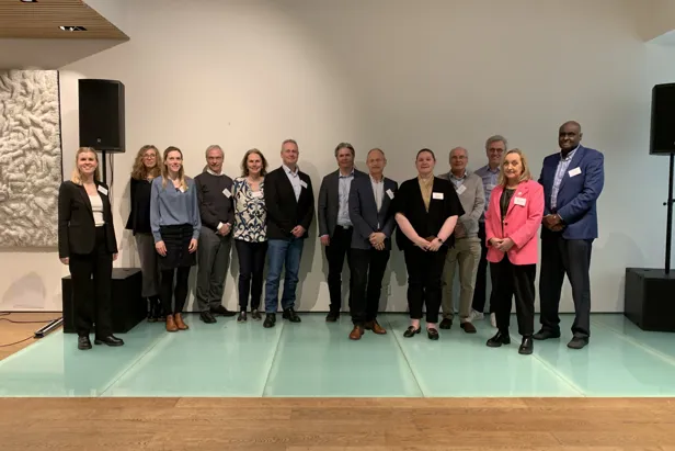 A group of people posing for a photo