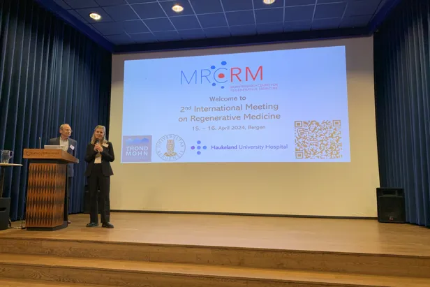 A man and woman on a stage