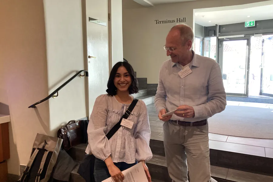 A man and a woman standing in a room