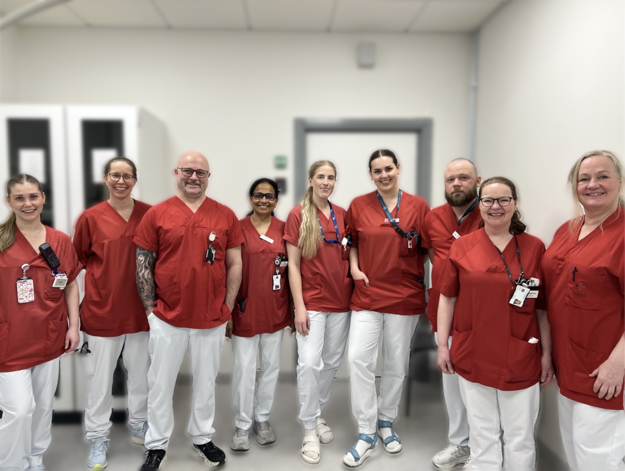 A group of people wearing red shirts