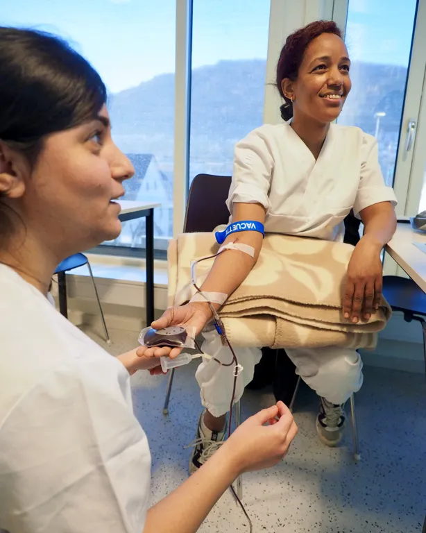A doctor talking to a patient