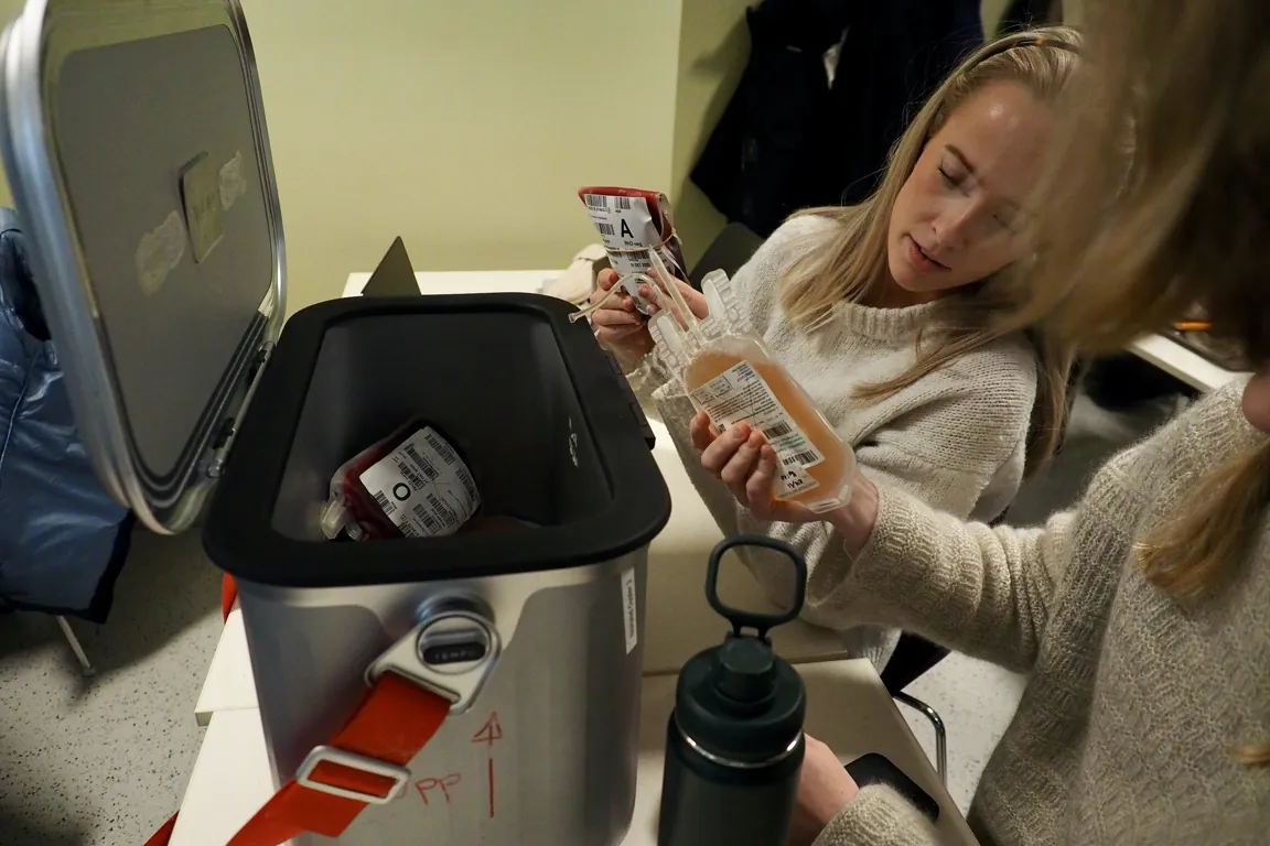 A person looking at a device