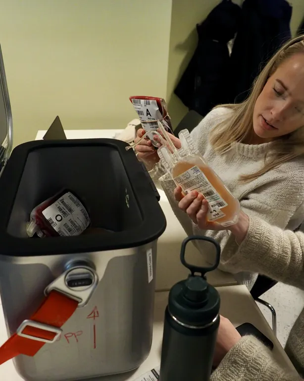 A person looking at a device