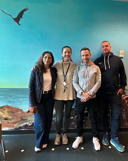 A group of people posing for a photo