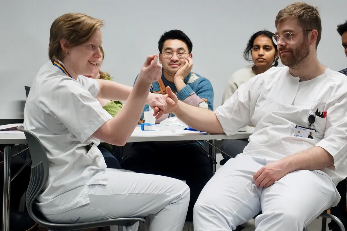 A group of people sitting at a table
