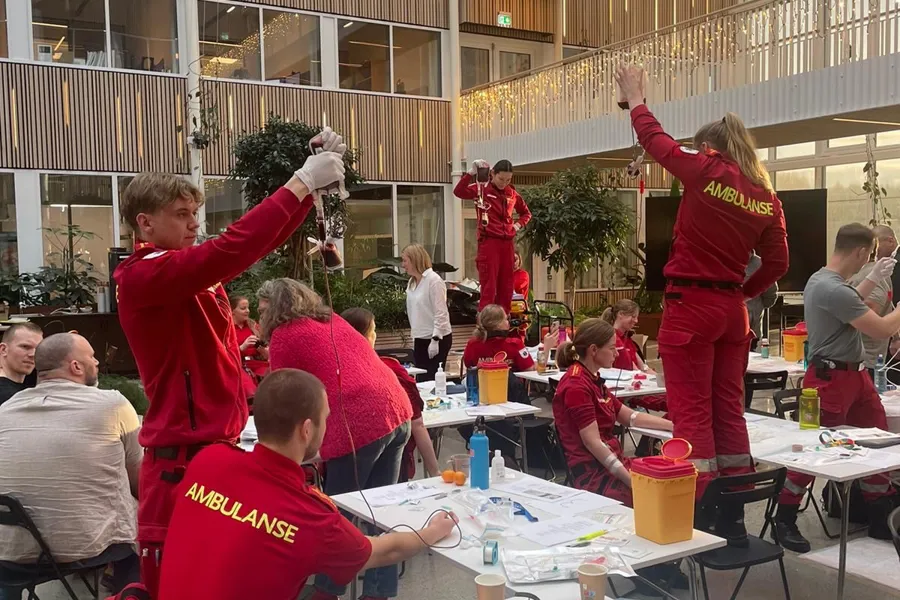 A group of people in red uniforms