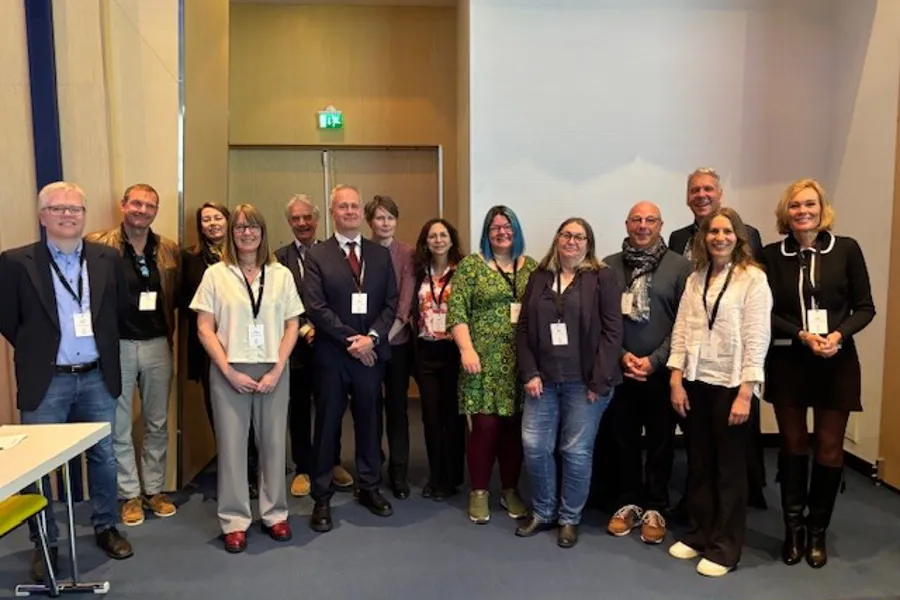 A group of people posing for a photo