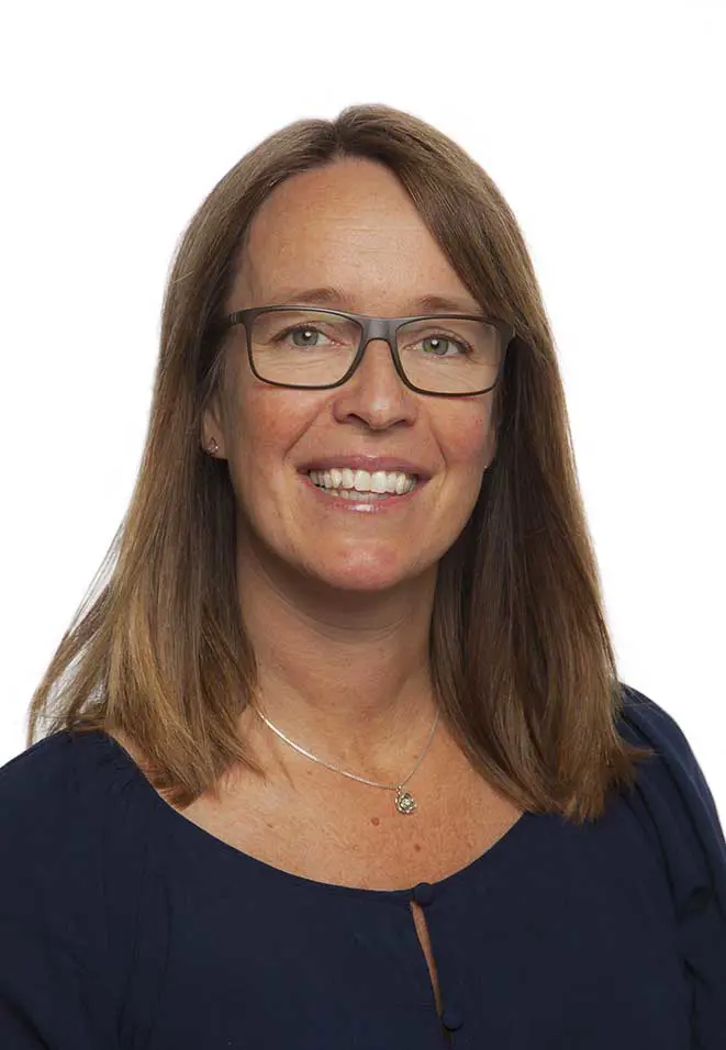A woman wearing glasses