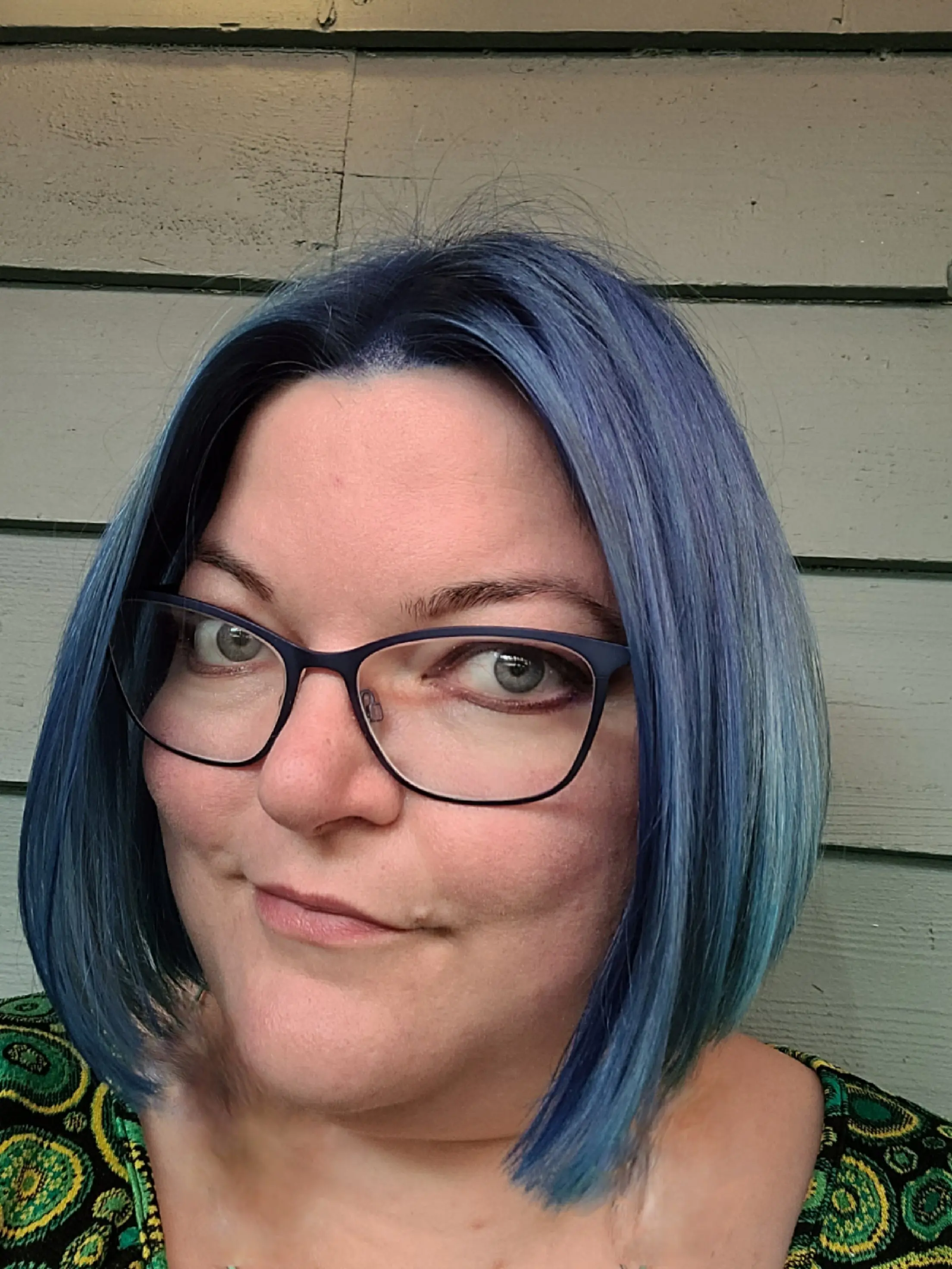 A woman with blue hair