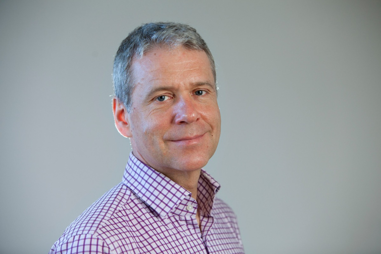 A man smiling for the camera