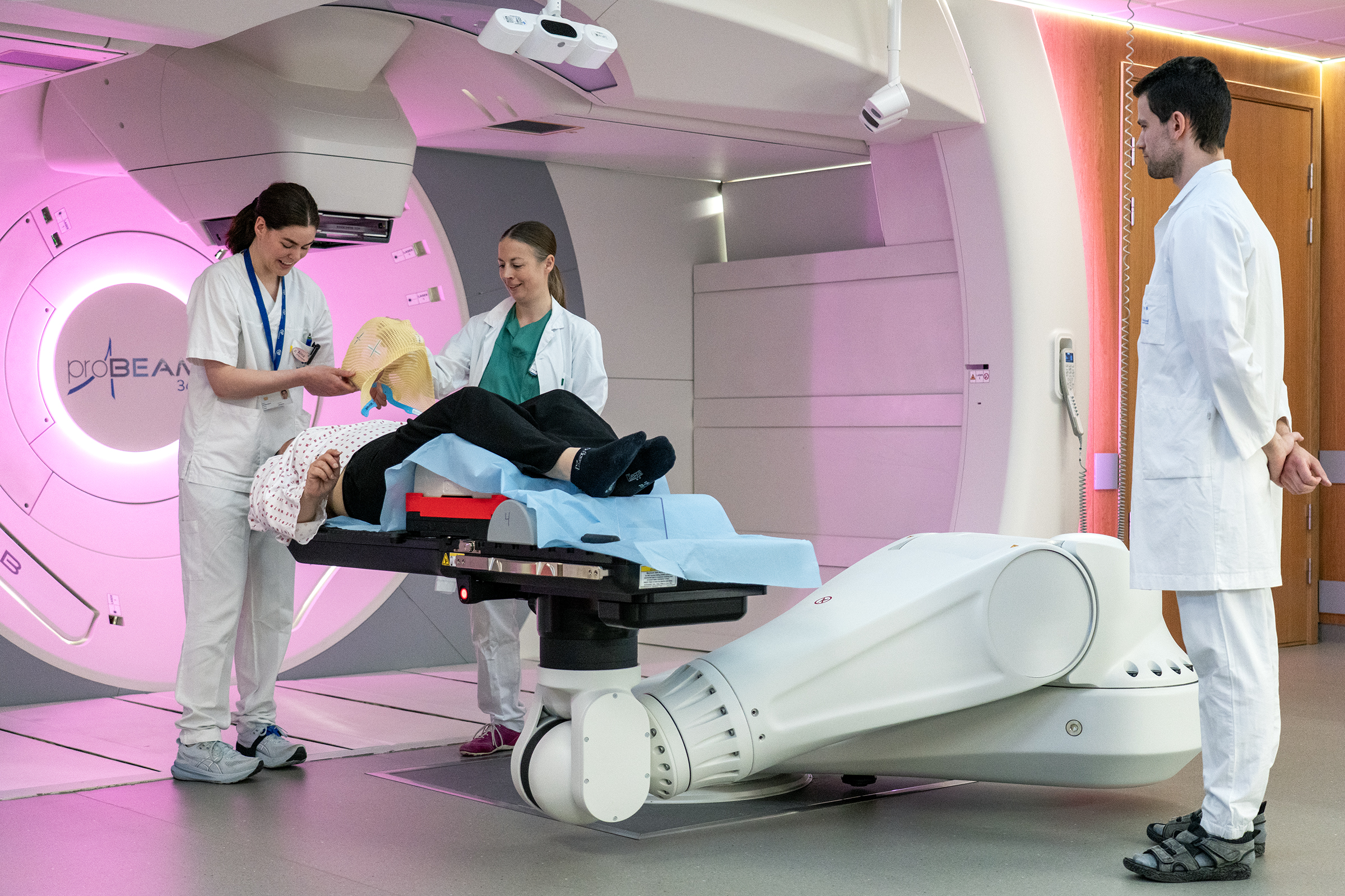 A group of doctors and a patient