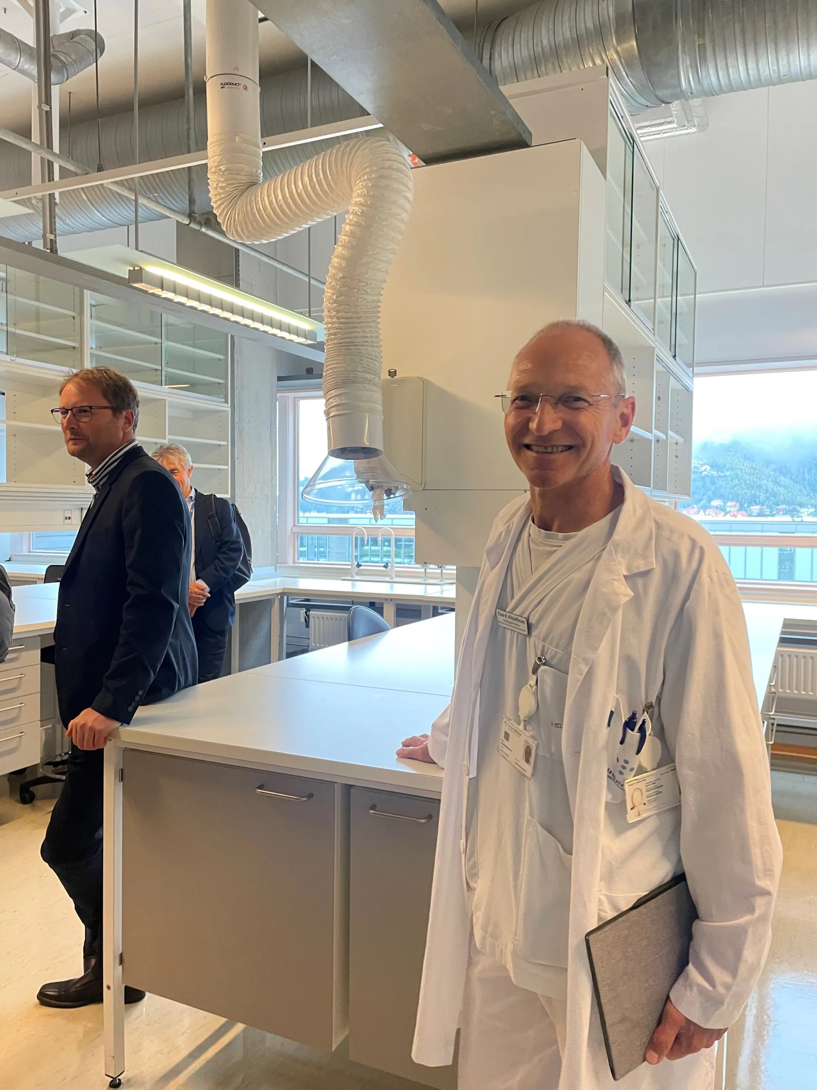 A person in a white coat