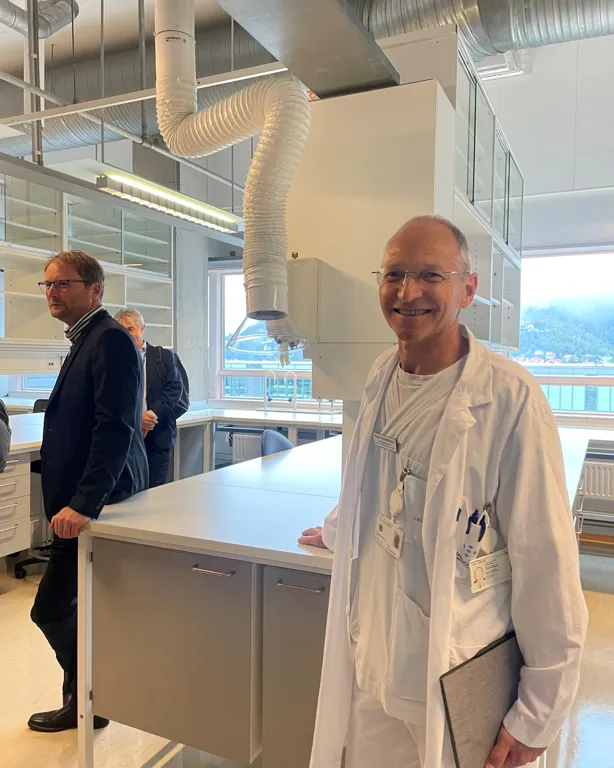 A person in a white coat