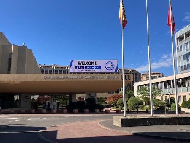 A building with flags in front of it