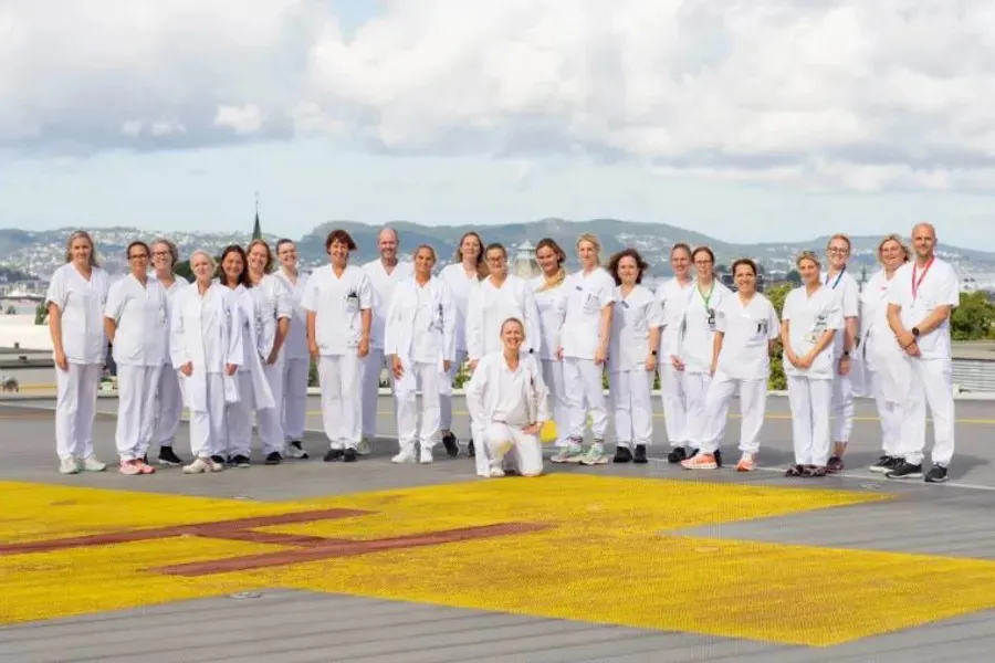 A group of people in white uniforms
