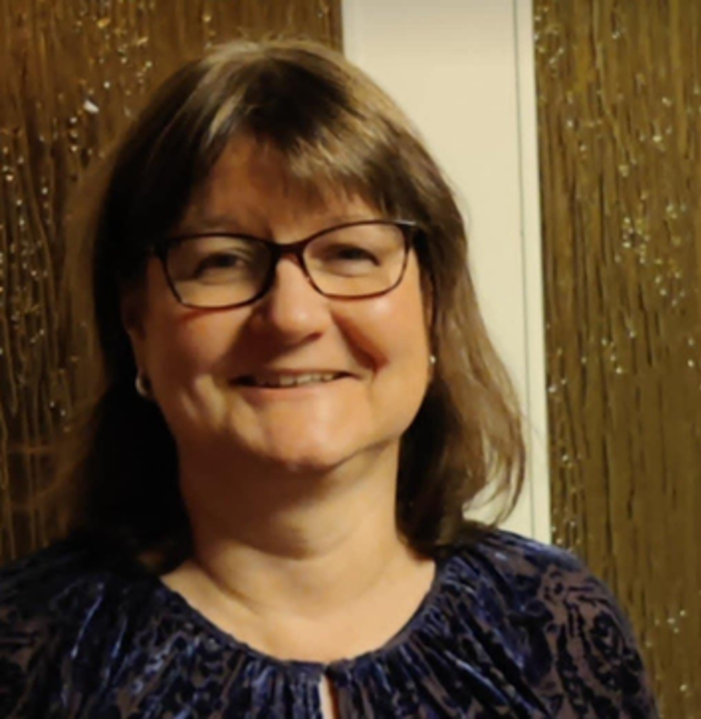 A woman wearing glasses