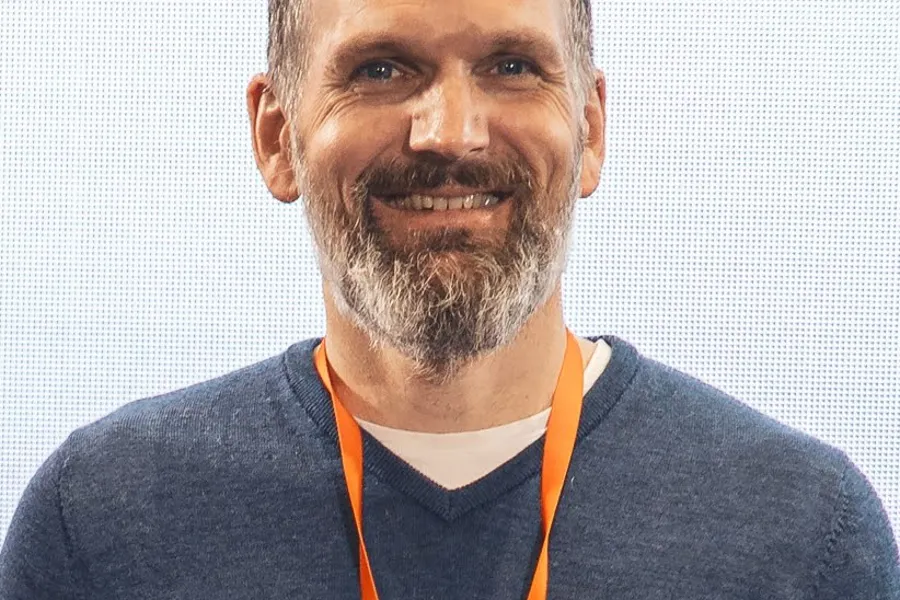 A man smiling for the camera