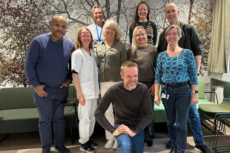 A group of people posing for a photo