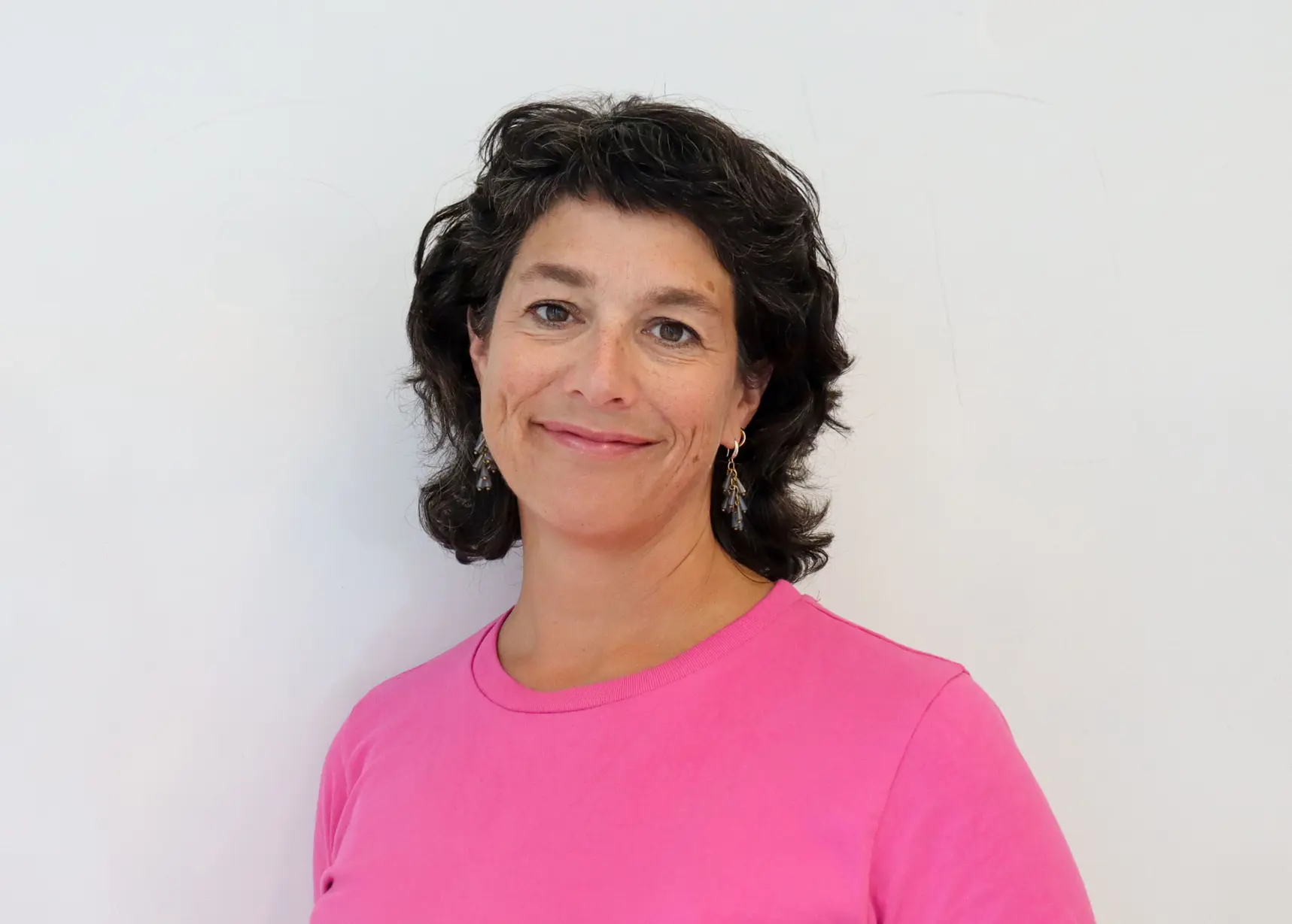 A person in a pink shirt