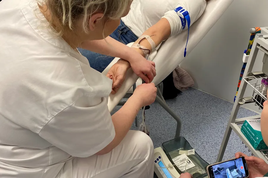 A doctor examining a patient