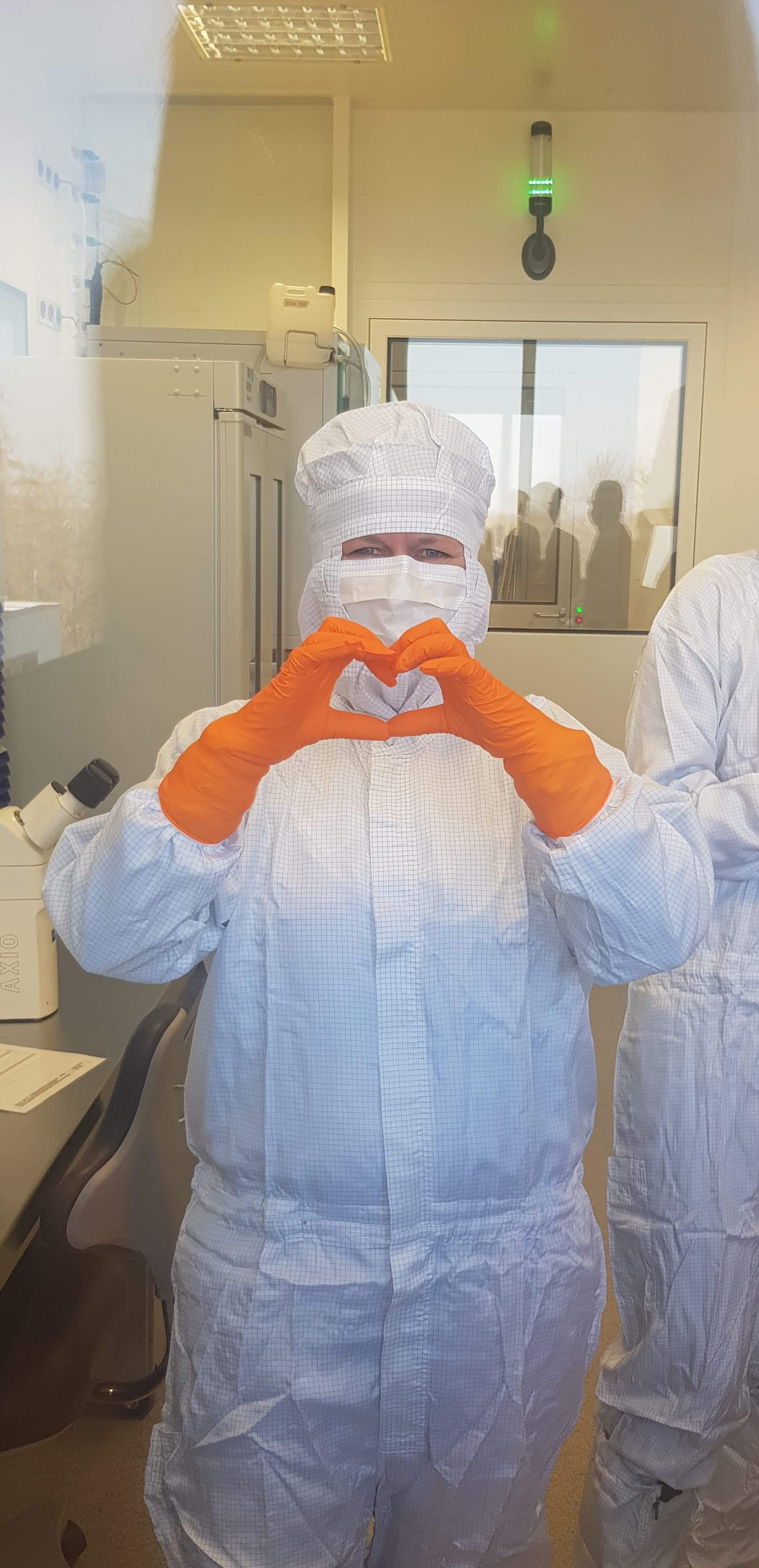 Person dressed in infection control  equipment in Laboratory. Photo