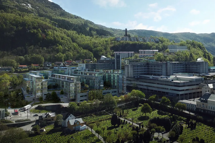 Eksteriør - arkitekttegning av Glasblokkene plassert på foto av Haukeland campus med Sentralblokka og gravplass i forkant. Foto