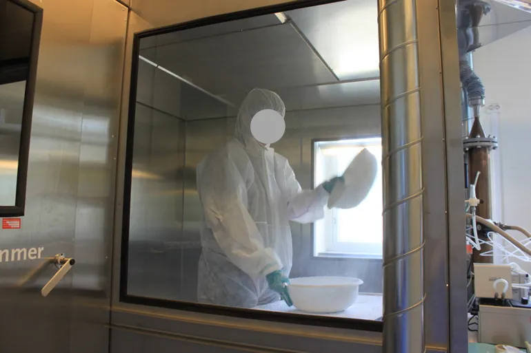 A person in a white suit