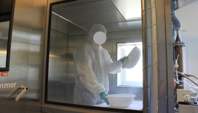 A person in a white suit
