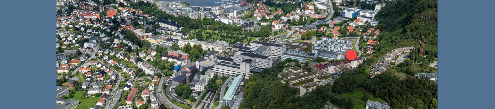 Red dot indicating location of Eitri in the hills behind Haukeland University Hospital. Photo