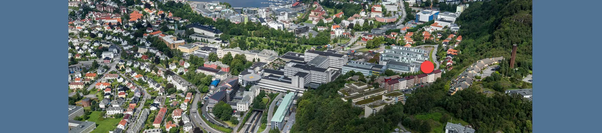 Red dot indicating location of Eitri in the hills behind Haukeland University Hospital. Photo