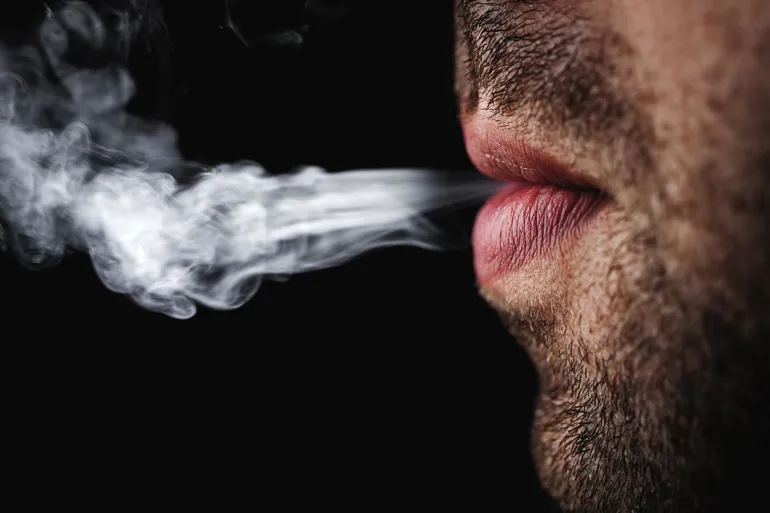young man smoking