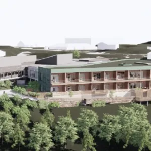 En bygning omgitt av trær