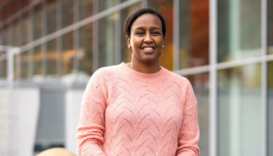 A woman in a pink shirt