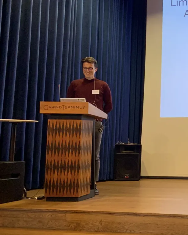 A person standing at a podium