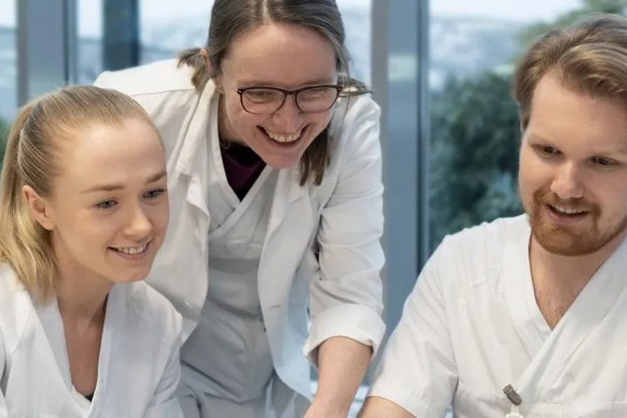 A group of people smiling