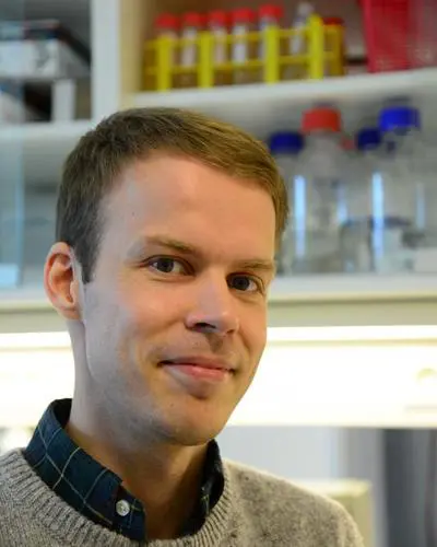 A man smiling for the camera