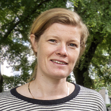 A woman smiling for the camera