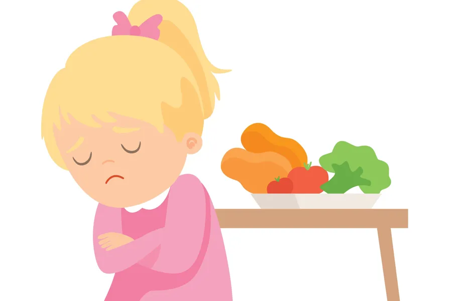 Eit barn som ikkje vil ete maten som står på bordet.