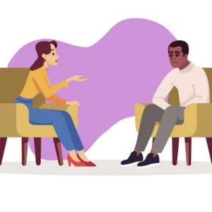 En mann og en kvinne som sitter mot hverandre