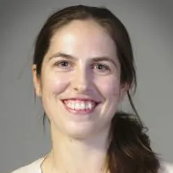 A close-up of a woman smiling